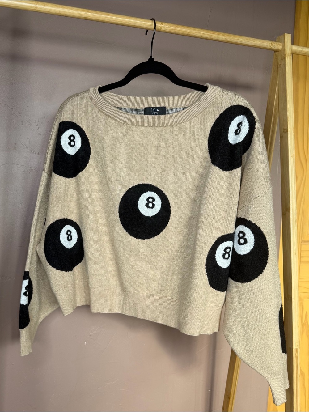 Dressed in LALA Beige Crewneck Sweater with Black & White 8-Ball Motif